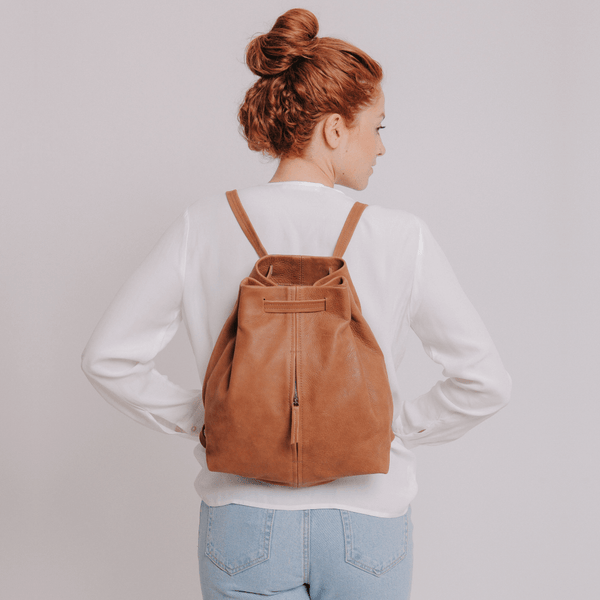 Leather drawstring backpack on sale